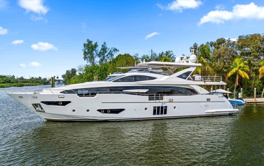 Spacious luxury yacht cruising through turquoise waters, offered by Ozgun Yachting