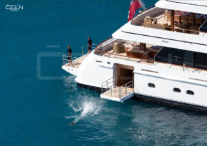 Luxury motor yacht cruising through Greek islands on a charter from Bodrum with Özgün Yachting.