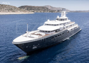 Luxury motor yacht cruising through Greek islands on a charter from Bodrum with Özgün Yachting.