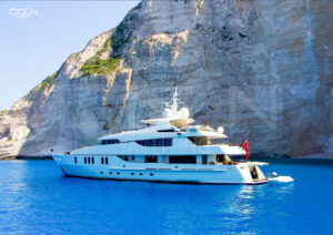Luxury motor yacht cruising through Greek islands on a charter from Bodrum with Özgün Yachting.