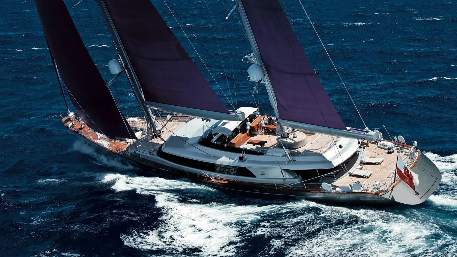 Baracuda Valletta sailing yacht on open sea with sleek silver hull and luxury deck design