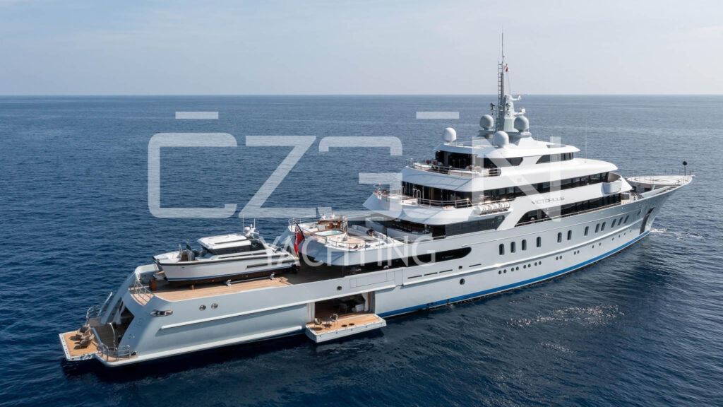 Mediterranean mega yacht charter yacht sailing in turquoise waters near the coast of Turkey and Greece.