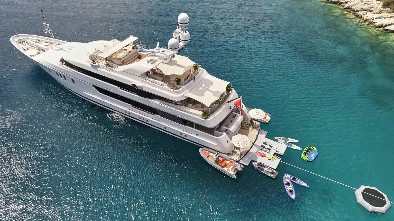 Aerial view of SEAHORSE mega yacht sailing in the Mediterranean, highlighting her luxury design, spacious sun deck, and elegant silhouette.